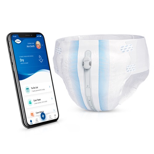 Mobile phone showing the TENA SmartCare Family Care app next to TENA Pants with the TENA SmartCare Change Indicator attached. Mobile phone showing the TENA SmartCare Family Care app next to TENA Pants with the TENA SmartCare Change Indicator attached.